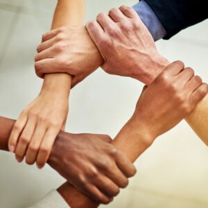 Team hält sich an den Händen